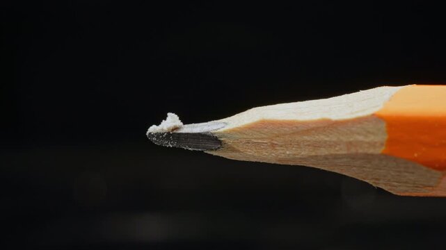 Lethal dose of fentanyl on the tip of a pencil. Two milligrams of fentanyl is lethal dose for humans. Synthetic narcotic analgesic drug. Tiny pile of powder on a pencil tip to give a sense of scale.