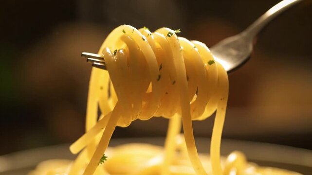 Delicious hot spaghetti twirled on a fork, steaming fresh from the kitchen