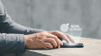Goal achieved high level planning business success smartphone male hand digital target strategy motivation achievement objective career concept
