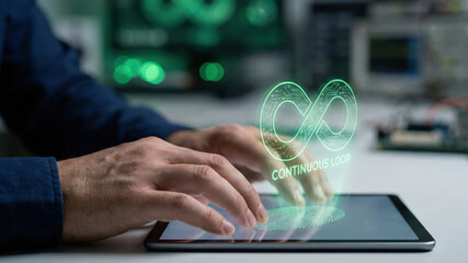 Technology loop tablet high green infinity symbol glowing level interface planning concept hologram futuristic hand touch work