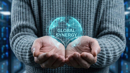 High tech synergy level concept planning in hand for global cooperation and network vision with hopeful glow in modern data center background