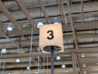 Warehouse aisle number markers for management and navigation