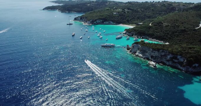 Aerial view of yacht boats achored at most beautiful beaches of Greece - Vrika in Antipaxos. Ionian islands