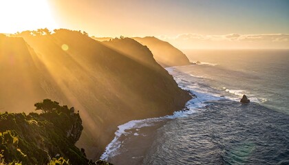 Golden hour illuminates coastal cliffs, sea, and rock formations with dramatic light beams, tranquil scene
