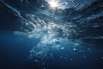 Underwater view of sunlit bubbles