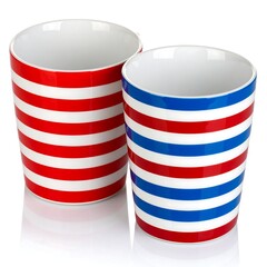 Two striped ceramic cups in red, white and blue colors against white