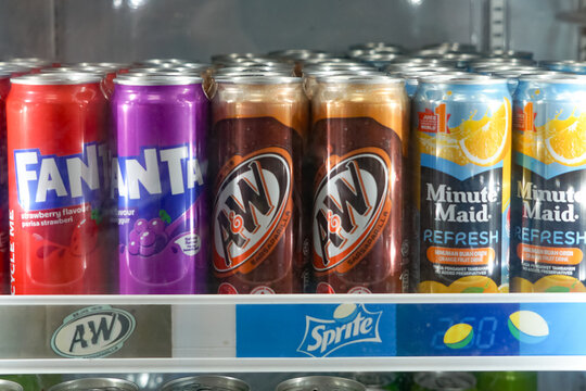 Perlis, Malaysia, December 3, 2025: Refrigerated Shelf Display of Canned Beverages