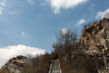 Old ruins in the rocks with sky and clouds on Markovo tepe. Plovdiv
