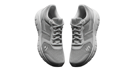 Monochromatic minimalist running shoes on a black backdrop capturing athletic footwear