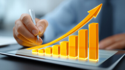 A hand interacting with a digital bar chart on a touchscreen illustrating business growth performance analysis and financial decision making.
