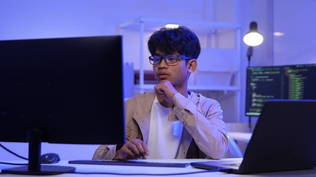 Programmer,  Software Developer codeing on computer. Professional IT Programmer Developing Application, Program Writing code at Office.