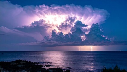 Dramatic coastal thunderstorm with lightning illuminating the clouds