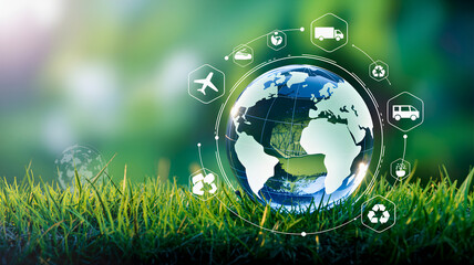 Global logistics and transportation network encircling the Earth with sustainability icons and green grass backdrop
