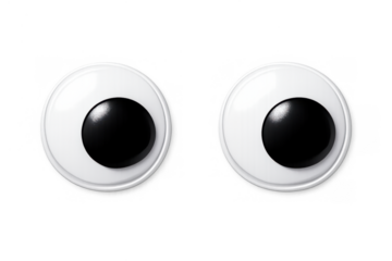 Googly eyes looking forward for fun craft projects, adding a humorous and cartoonish touch to creations on transparent background