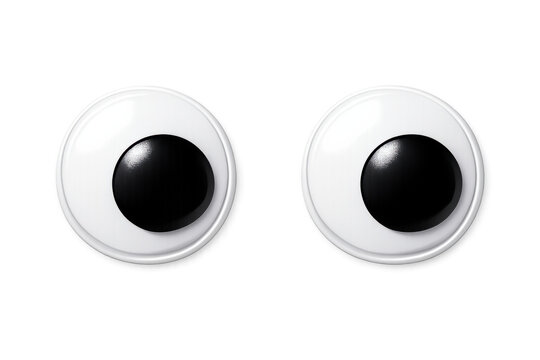 Googly eyes looking forward for fun craft projects, adding a humorous and cartoonish touch to creations on transparent background