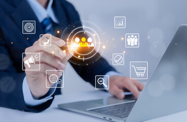 Business professional using digital interface for customer relationship management and target audience analysis, showing marketing strategy, data analytics, online business growth.