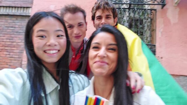 Diverse friends with a rainbow flag making a video call