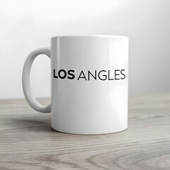 a white coffee mug with the word los angeles
