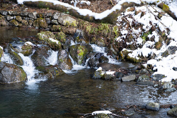 Fototapeta premium Winter scenery of Kyoto, piled up snow and waterfall