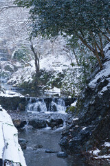 Winter scenery of Kyoto, piled up snow and waterfall