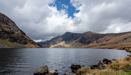 Mountain lake landscape with morning mist and copy space