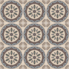 Seamless mosaic tile showing a geometric floral pattern in muted colors