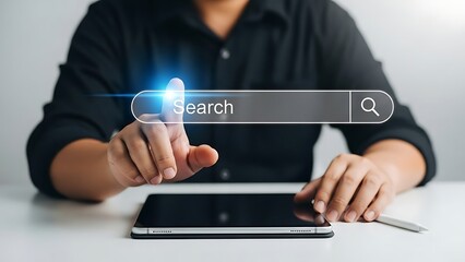 Person's finger touching search bar on tablet screen with blue light effect finger touching screen technology