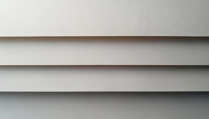 Light gray cardboard paper layers create horizontal lines. Subtle texture adds depth to the blank surface. Useful for backgrounds and design.