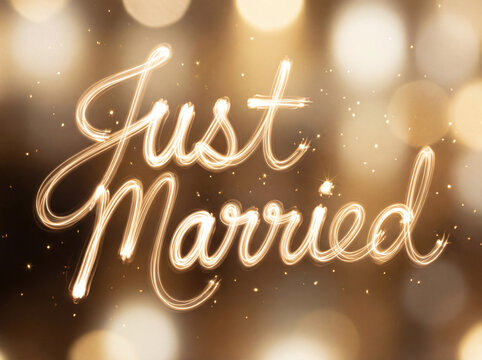 Just Married golden glow text with celebration lights