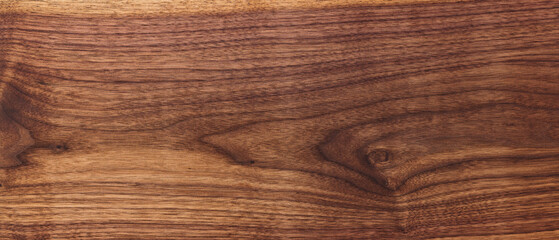 Texture of black walnut board with oil finish