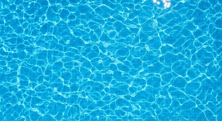 Clear blue swimming pool water with shimmering reflections and gentle ripples perfect for summer vacation or relaxation themed projects