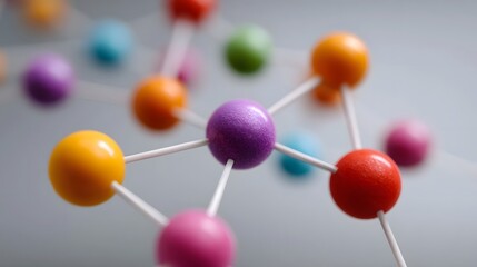 Abstract representation of a molecular network featuring interconnected colored spheres and nodes symbolizing connections and complex systems