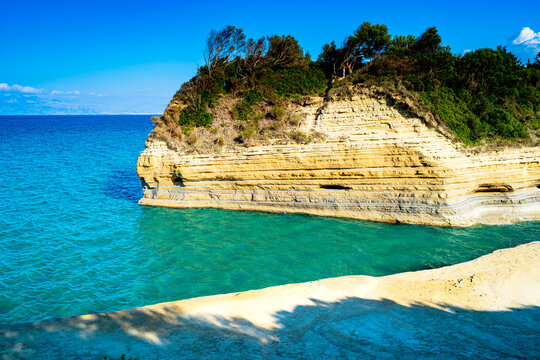 Famous tourist spot Canal D'Amour on island Corfu in Greece with turquoise water and beautiful rock formations.