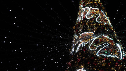 Decorative Spiral Lights Transform Dark Backgrounds Into Joyful Seasonal Displays, Vividly Glowing Tree Ornaments Combined With Radiant Strands Craft Perfect Holiday Editorial Imagery