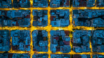Geometric Night Grid &ndash; Aerial Cityscape with Illuminated Streets