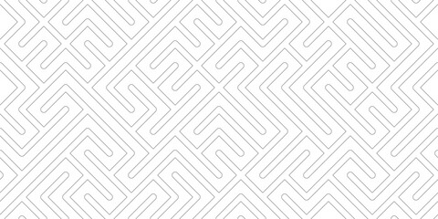 Seamless geometric maze pattern with interlocking angular lines in light gray tones creating soft abstract labyrinth background for surface design, wallpaper, textile, stationery