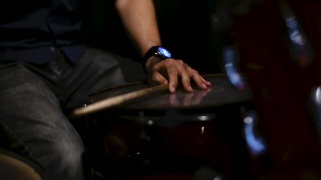 close up Man Playing Drum Set in Music Studio