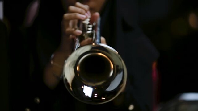 Close up hand of Trumpet Player Practicing in a Music Rehearsal Room