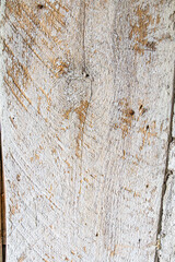 Detailed close up of rustic wooden planks with natural grain, rough texture, scratches, and weathered surface. Perfect background for design projects, vintage decor, carpentry, and creative artwork.