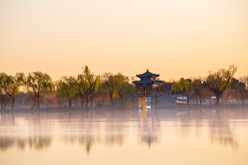 Classical architecture in morning mist on Kunming Lake, Summer Palace, Beijing, China