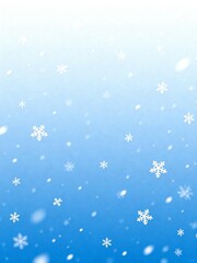 Snowflakes falling against blue sky