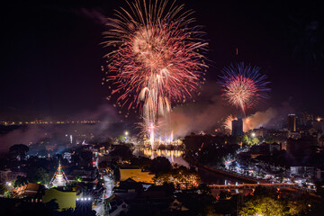 New year firework celebration in Chiang mai city, Thailand for background usage.