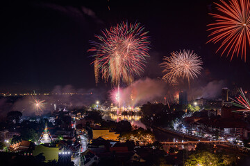 New year firework celebration in Chiang mai city, Thailand for background usage.