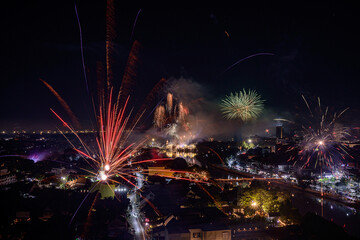 New year firework celebration in Chiang mai city, Thailand for background usage.