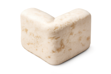 A gourmet snack featuring a heart shaped cookie, stone, and chocolate is isolated on a fresh white background with a tasty slice of French cheese and dairy milk for a studio breakfast