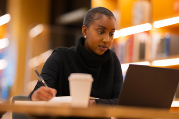 Focused student studying in the library
