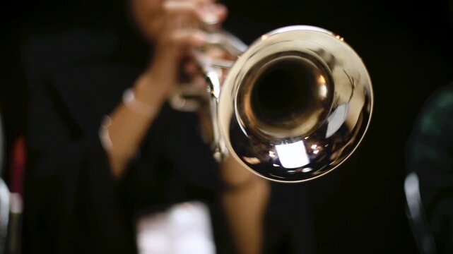 Close up hand of Trumpet Player Practicing in a Music Rehearsal Room