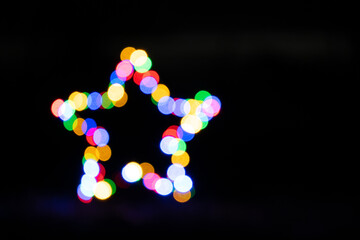 five-pointed blurred colourful star