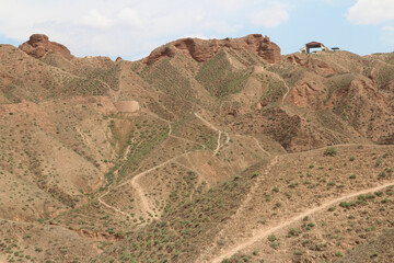 Summer scenery of the Yellow River Stone Forest National Geological Park with a pavilion on top in Jingtai county, Gansu province of China