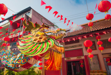 Lunar new year celebrations around the chinatown , Dragon parade with red lantern.
